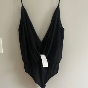 Tobi black deep Vneck bodysuit. Size M. Brand new